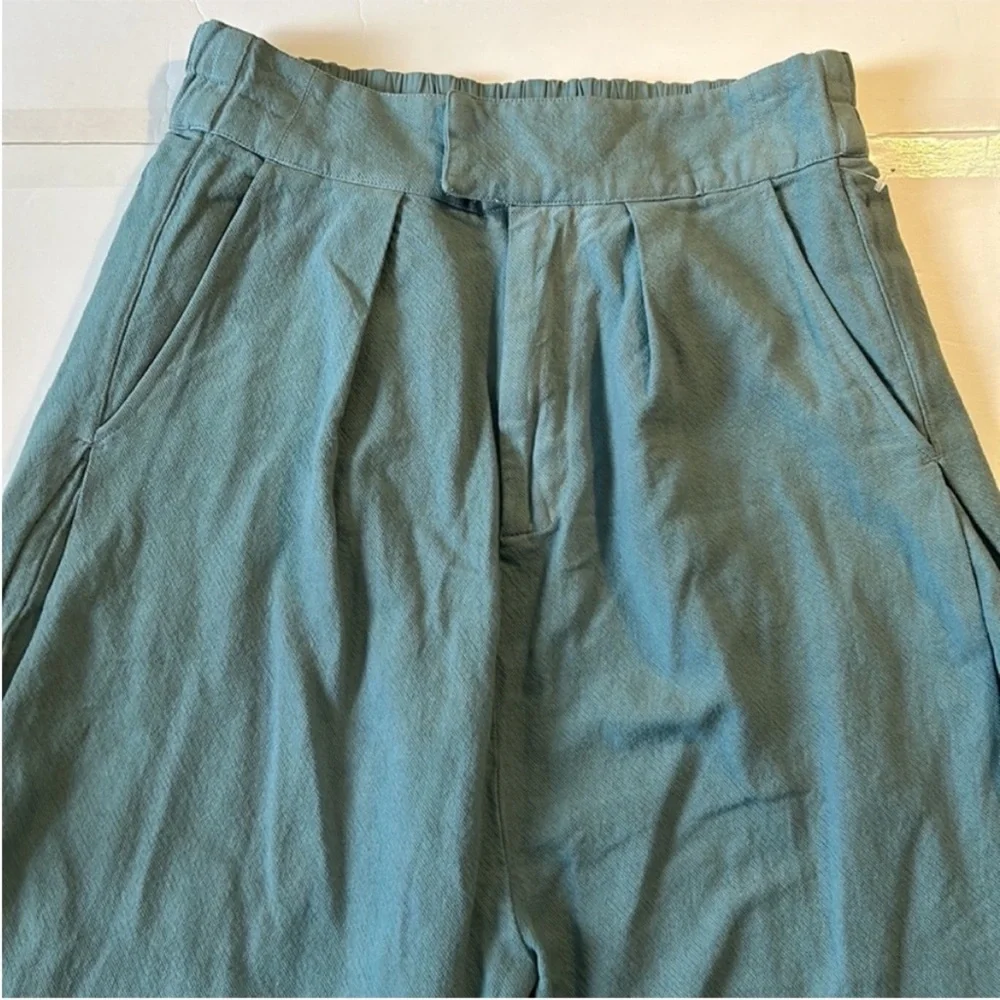 Free People Small Pants Cool Harbor Wide-Leg Trousers in blue zippered pockets - Picture 9 of 11